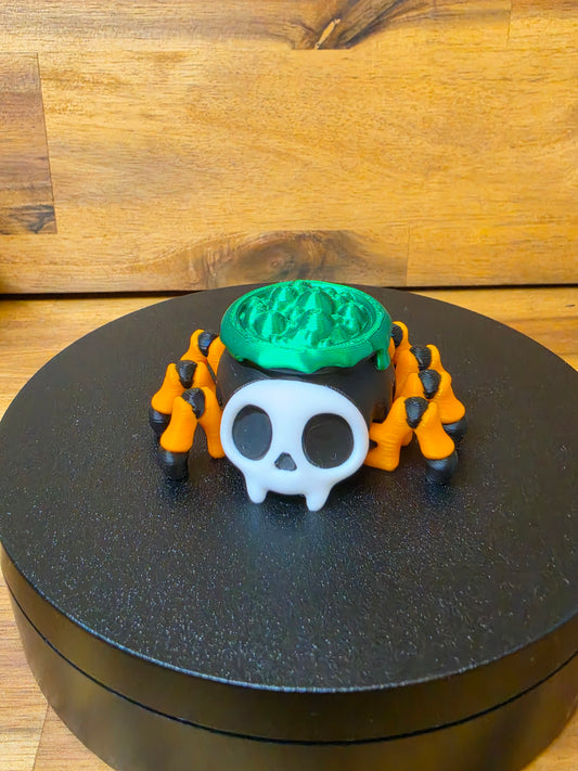 The Creepy Crawly Cauldron – Wiggly Skull Spider 🕷️💚✨
